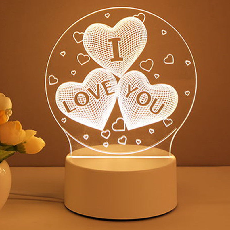 3D illusion desk lamp with acrylic panel glowing in warm light