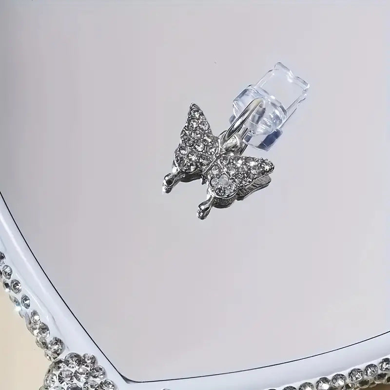Butterfly charm dust stopper for USB charging port