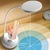 Clip on desk lamp illuminating books on study table