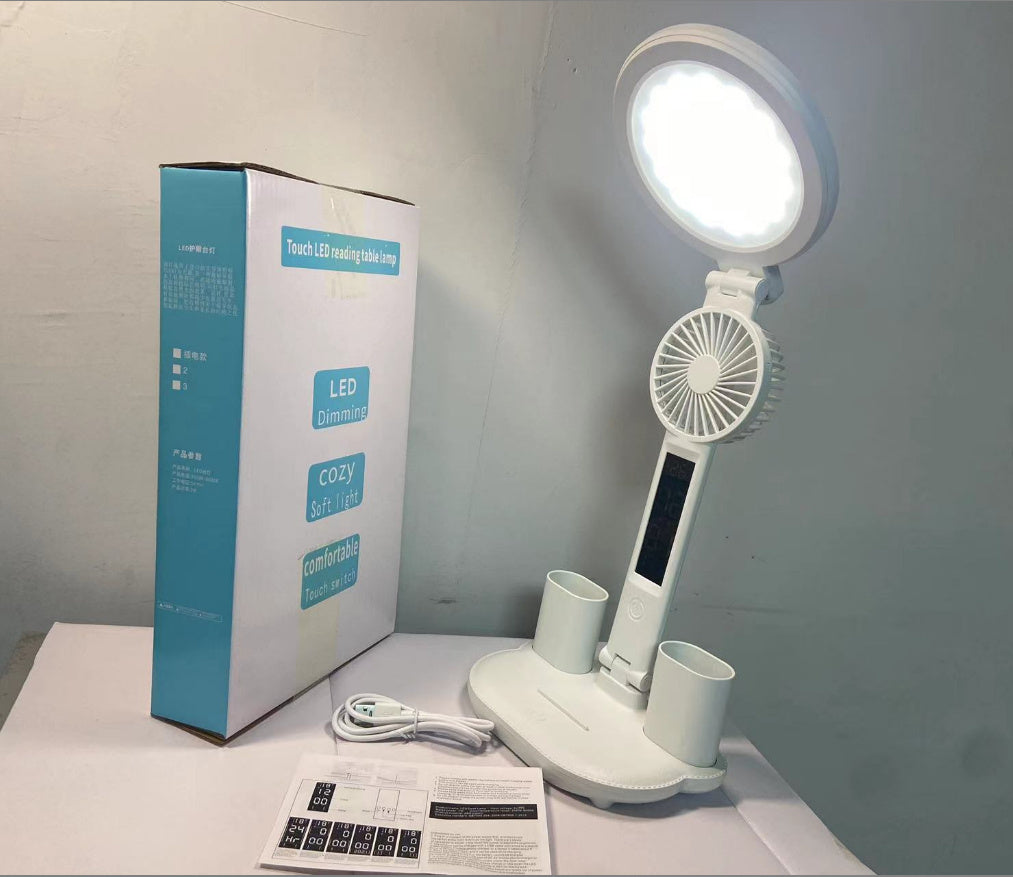 Desk lamp with clamp style portability