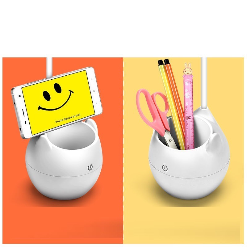 Desk lamp with USB port charging while lighting workspace
