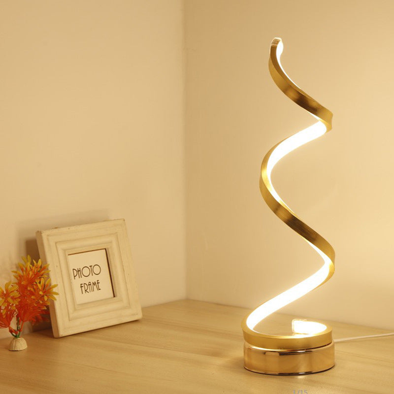 Dimmable cordless table lamp with spiral frame and soft light