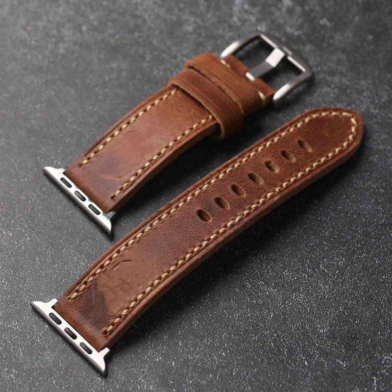 Unisex smartwatch band featuring solid buckle and durable leather build