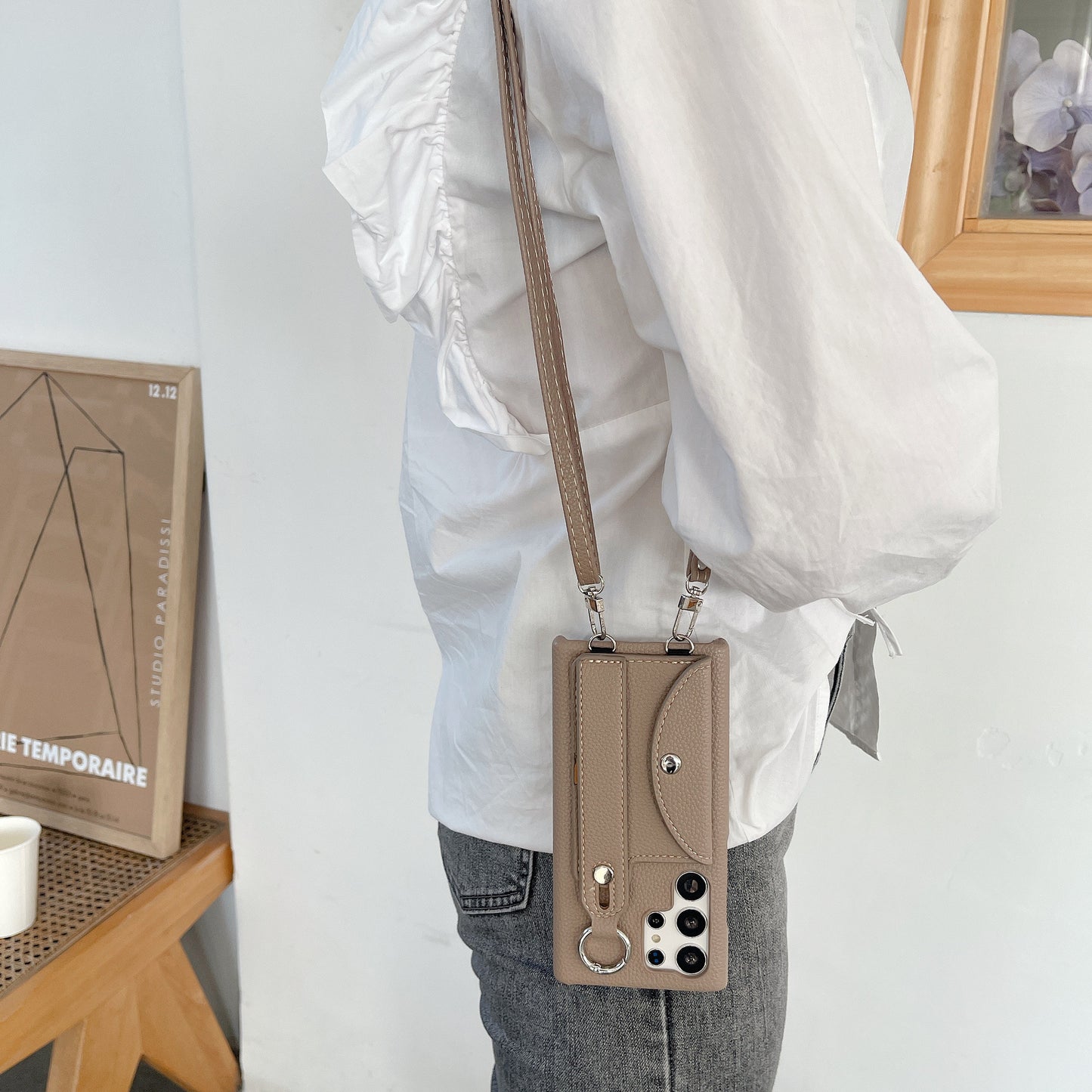 Protective Samsung case with crossbody strap and wrist strap in lychee design