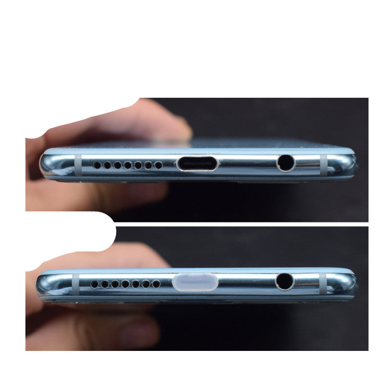 Black and white USB-C port protector to block dust and debris