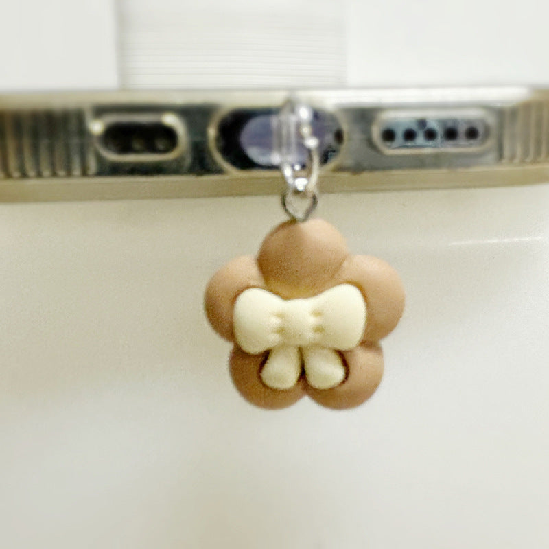 White flower design USB-C dust plug charm for phones