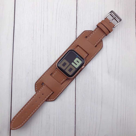 Bracelet-style leather cuff strap with secure buckle closure